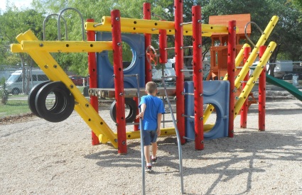 child at playground gym